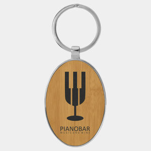 Personalized 3" x 1 3/4" Laserable Leatherette/Metal Bamboo Oval Keychain Thumbnail